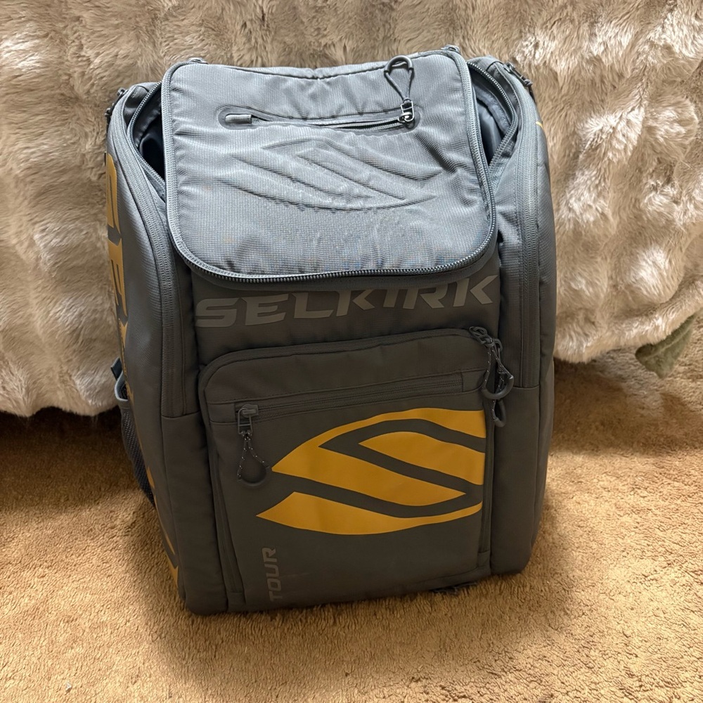 Stylish Gray pickleball Backpack with Gold Accents